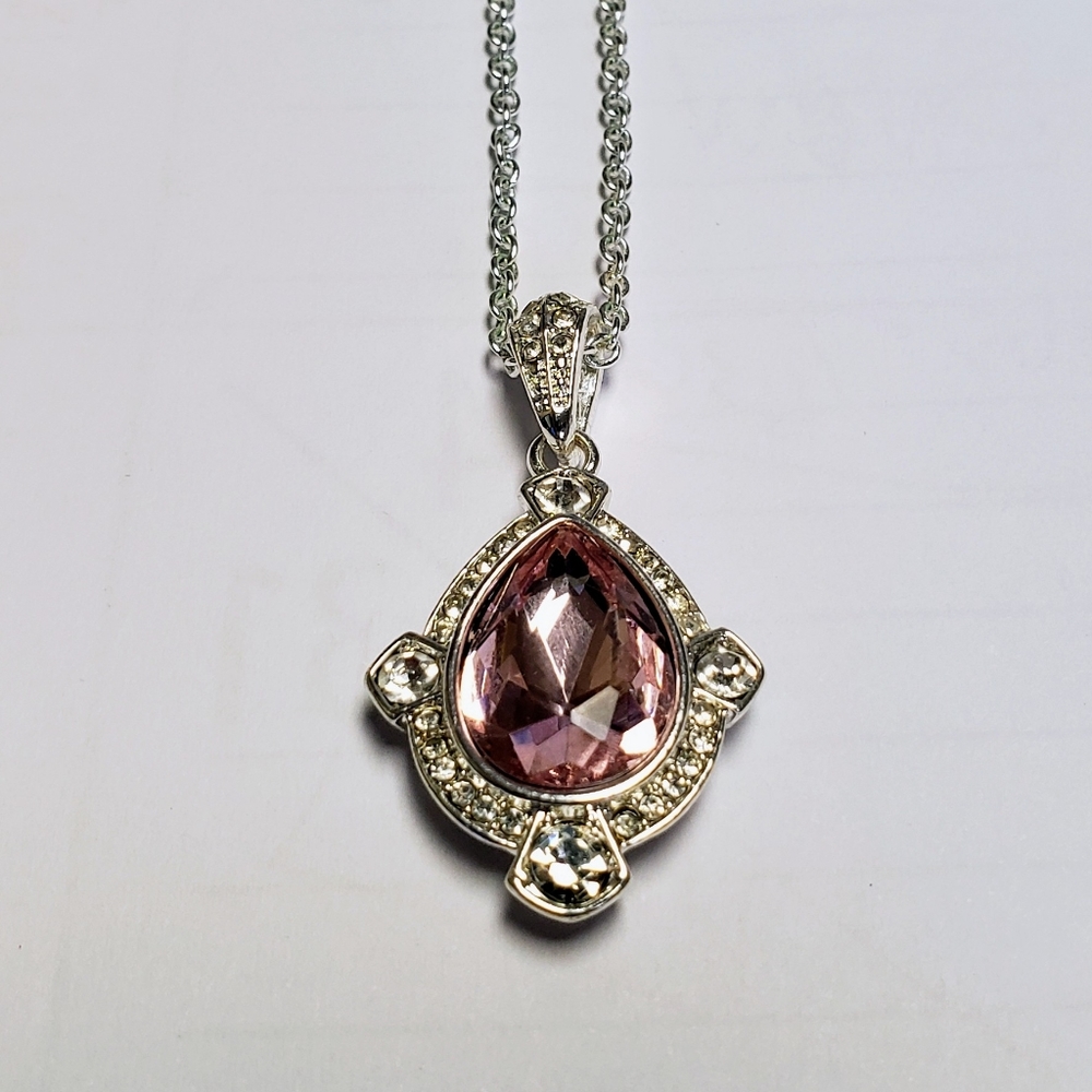 Avon necklace. Silver with pink stone.